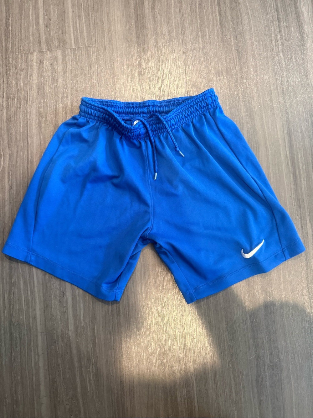 Nike Blue Athletic Training Shorts with White Swoosh